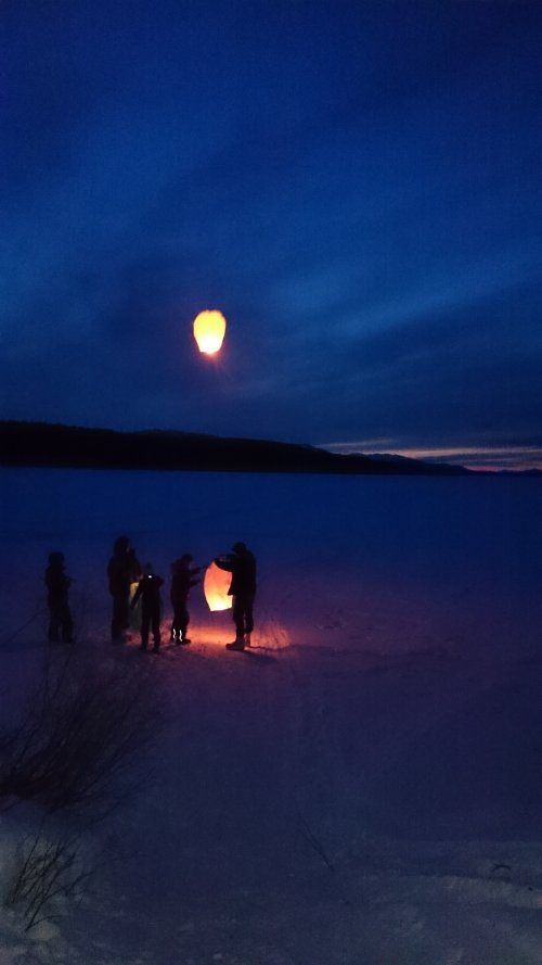 Bright chinese lanterns released in Yukon wilderness