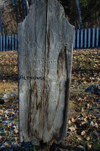 Weathered old headstone in the Freemason Cemetary, Dawson City, Yukon