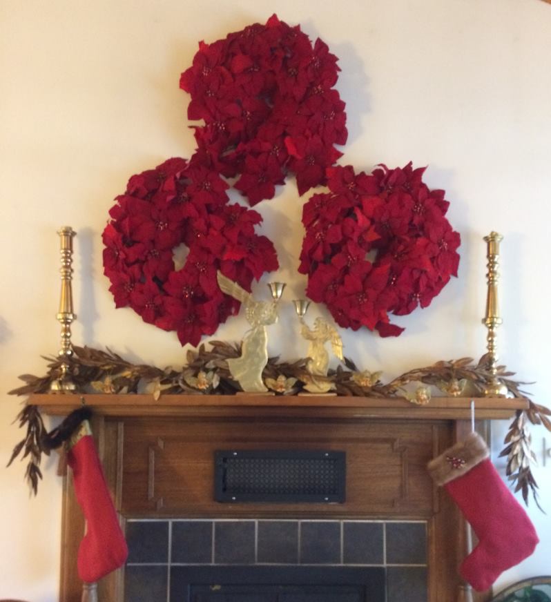 Holiday Wreaths Above the Fireplace